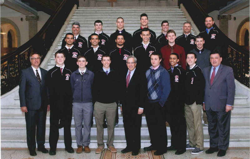 Pictured (L to R) 1st row: Sen. Mike Rodrigues, Jared Nye, Mitch Midwood, Jacob Cafarella, Rep. Bill Straus, Nate Hall, Noah Fernandes, Jason Gamache, Sen. Marc Pacheco. 2nd row: Will Santos, Evan Santos, Jordan Menard, Jacob Chavier, Bryant Salkind, Tyler Moureo. 3rd row: Head coach Steve Carvalho, Russell Noonan, Nick Rego, Matta Valles, Ryan Beatty, Assistant coach Chris Cabe, Assistant coach Adam Rogers. COURTESY OFFICE OF REPRESENTATIVE BILL STRAUS